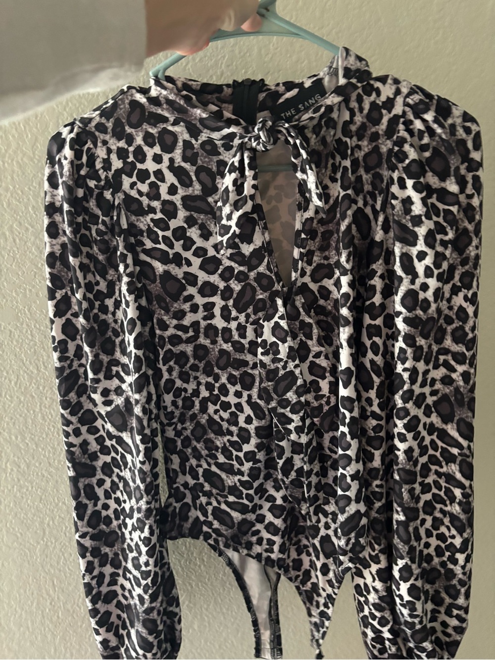 The SANG Black & White Leopard Tie-Neck Bodysuit